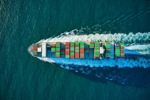 container ship at sea overhead view